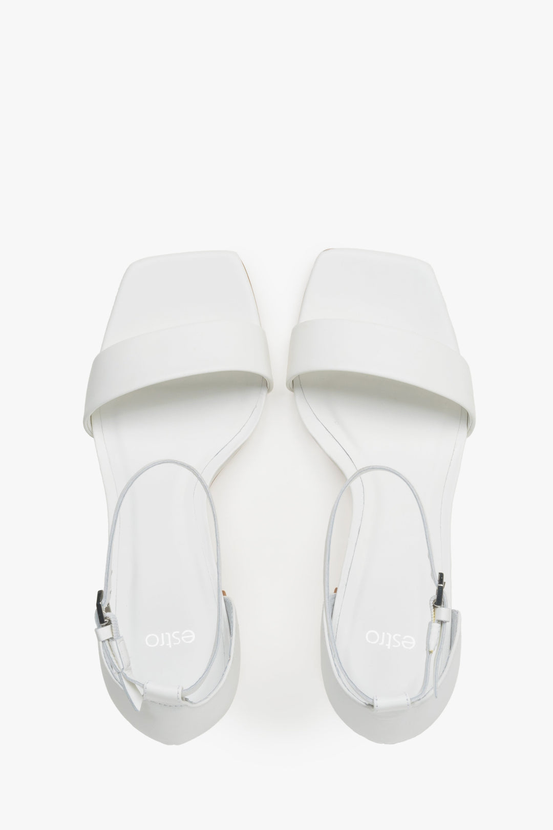 Białe sandały damskie na obcasie Estro.