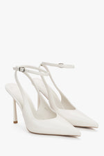 Białe czółenka damskie z odkrytą piętą typu slingback ze skóry naturalnej Estro ER00119279.