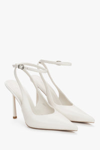 Białe czółenka damskie z odkrytą piętą typu slingback ze skóry naturalnej Estro ER00119279.