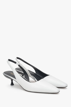 Białe damskie czółenka ze skóry naturalnej na niskim obcasie typu slingback marki Estro.​