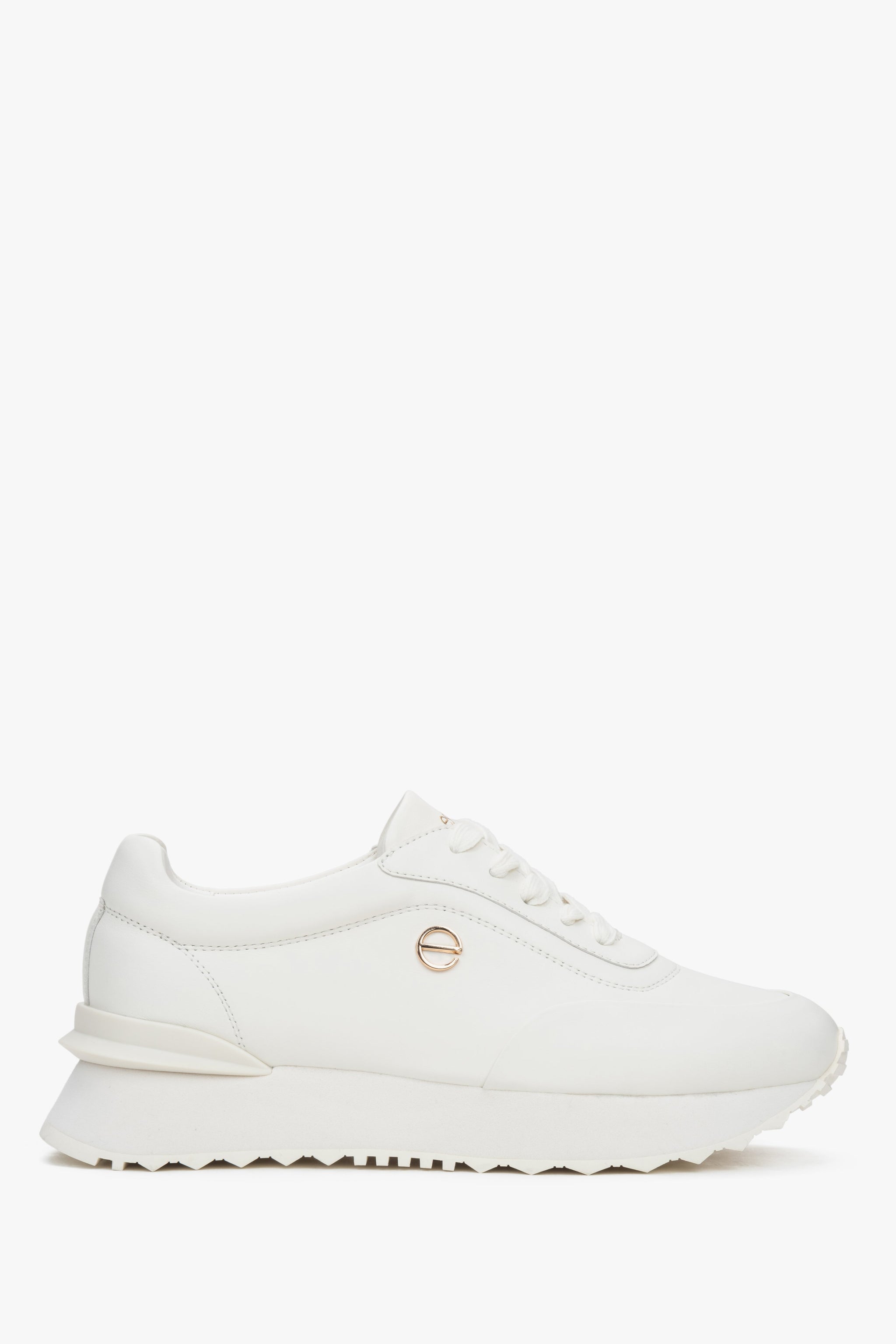 Białe skórzane sneakersy damskie ze sprężystą podeszwą Estro ER00116921.