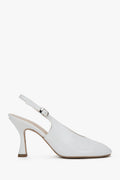Białe buty na obcasie typu slingback z włoskiej skóry lakierowanej Premium Estro ER00117541.