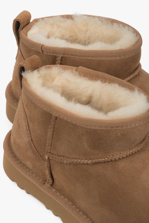 Damskie śniegowce Estro z brązowego weluru naturalnego z ciepłym, futrzanym ociepleniem.