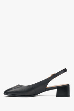 Stylowe czółenka damskie Estro w kolorze czarnym, typu slingback, osadzone na komfortowym, niskim obcasie. 
