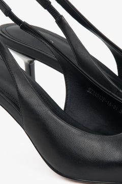 Czarne czółenka typu slingback na wysokim obcasie od Estro - zbliżenie na detale.