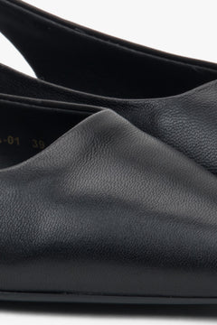 Stylowe sandały damskie slingback z czarnym wykończeniem i szpiczastym noskiem.