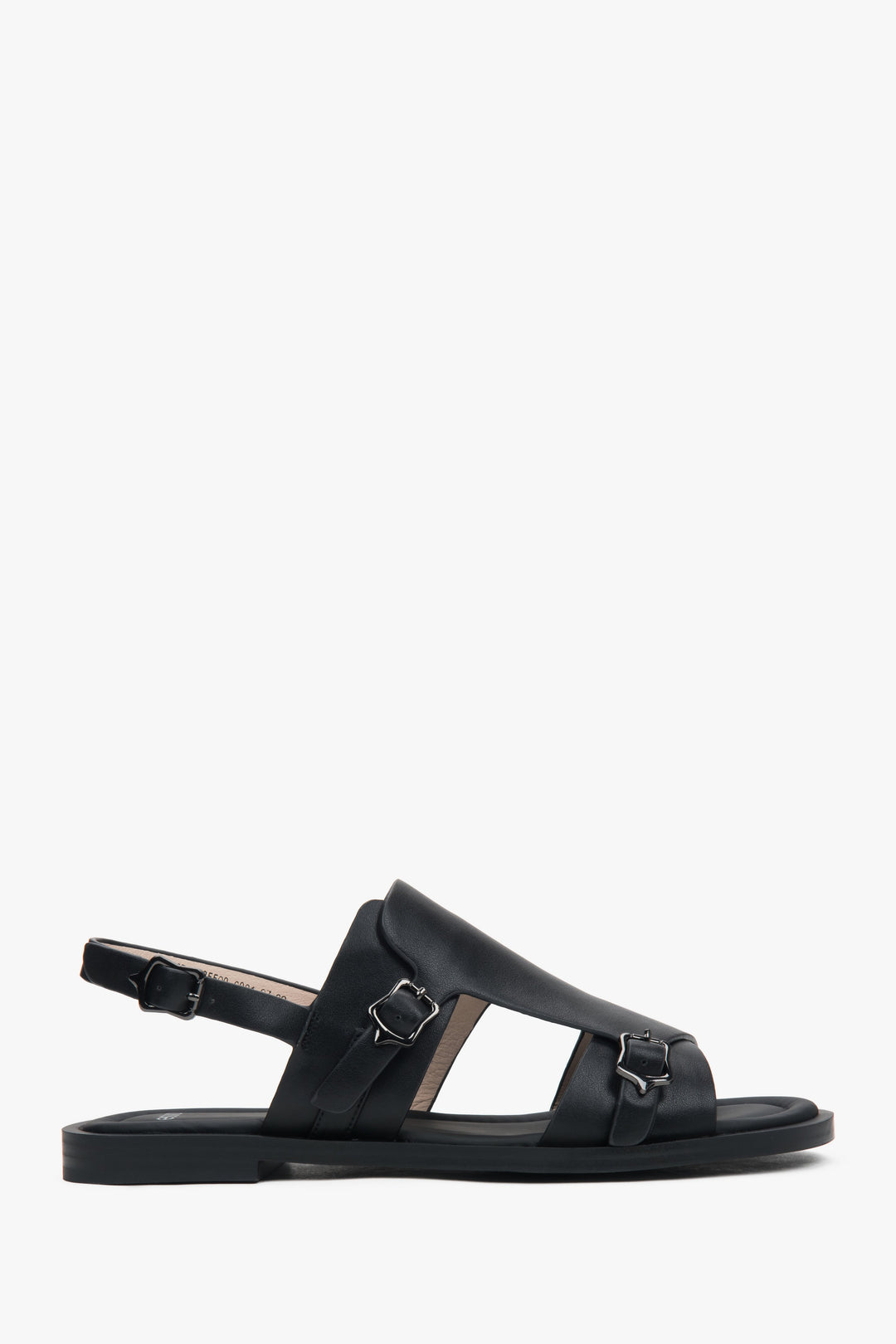 Czarne zabudowane sandały damskie na płaskiej podeszwie ze skóry naturalnej.