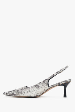 Skórzane czółenka damskie ze zwierzęcym wzorem na niskim obcasie typu slingback marki Estro.​