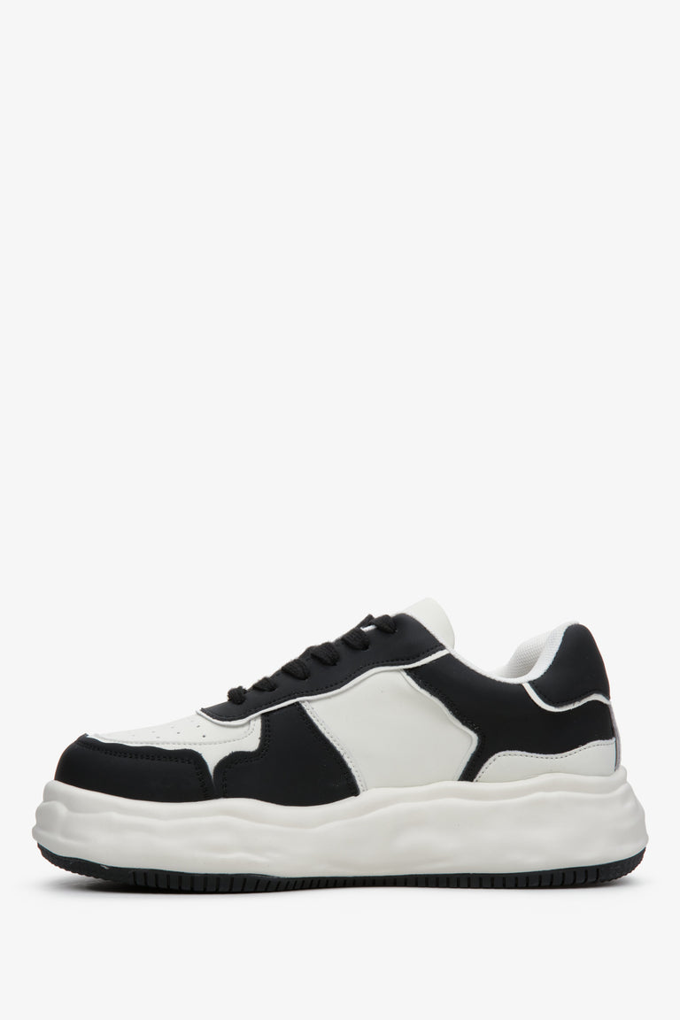 Skórzane sneakersy damskie marki Estro w kolorze czarno-białym - profil buta.