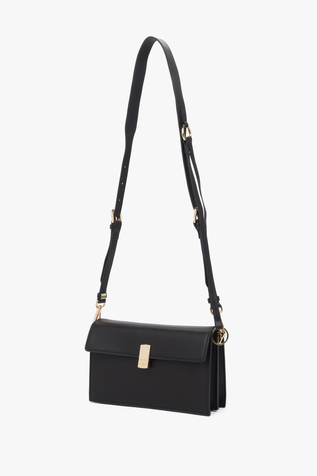 Stylowa ciemnobrązowa torebka na ramię ze skóry naturalnej z subtelnymi złotymi detalami.