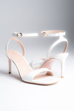 Białe sandałki damskie na szpilce ze skóry naturalnej Estro ER00119289.