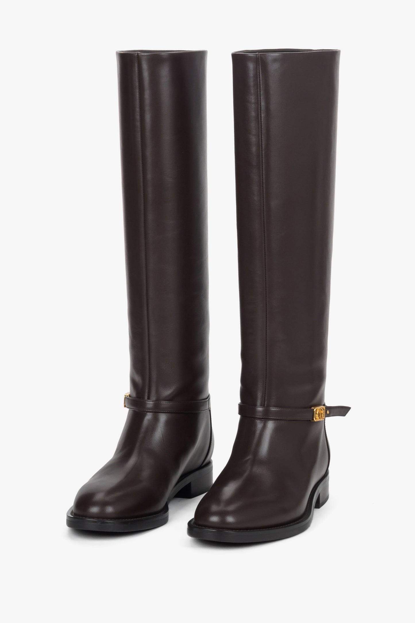 Damskie wysokie, ciemnobrązowe kozaki ze skóry naturalnej ze złotą sprzączką Estro.