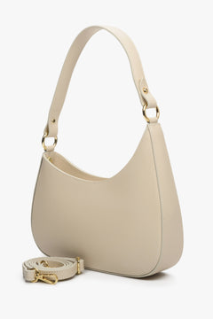 Damska, beżowa torebka typu shoulder bag z wymiennym paskiem Estro.