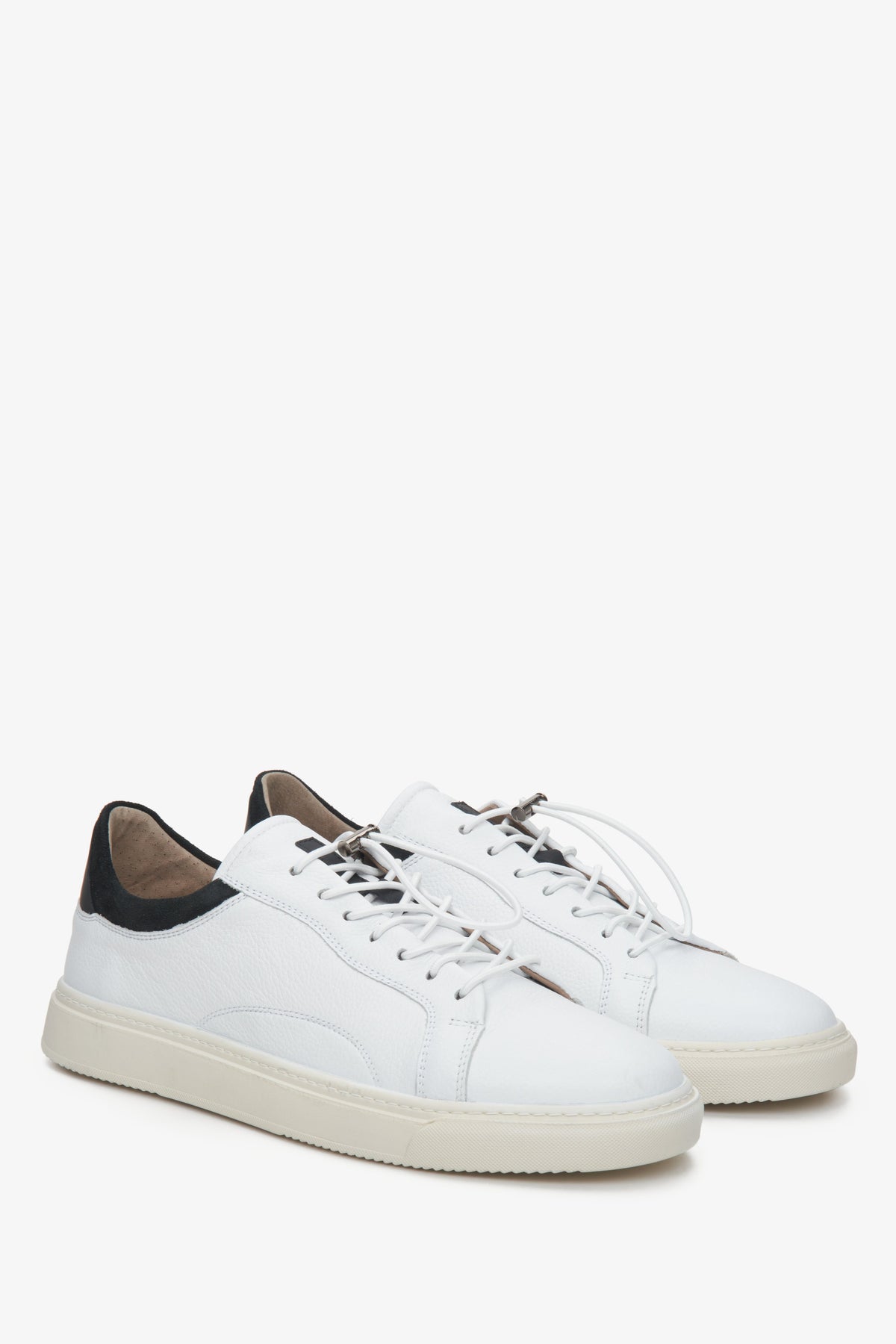 Sneakersy męskie ze skóry naturalnej Estro w kolorze białym ze sznurowaniem.