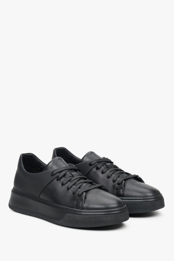 Damskie, skórzane sneakersy w kolorze czarnym ze sznurowaniem - prezentacja czubka i przyszwy bocznej buta.