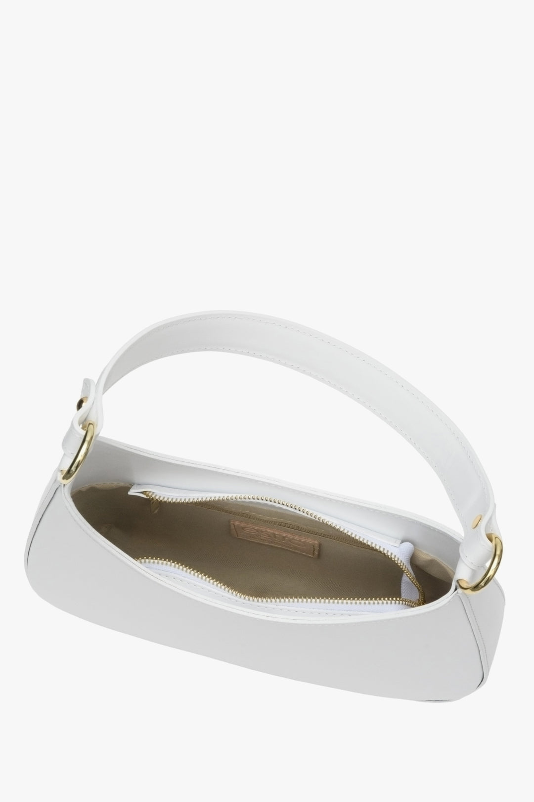 Damska torebka typu shoulder bag w kolorze białym z włoskiej skóry naturalnej - zbliżenie na wnętrze modelu.