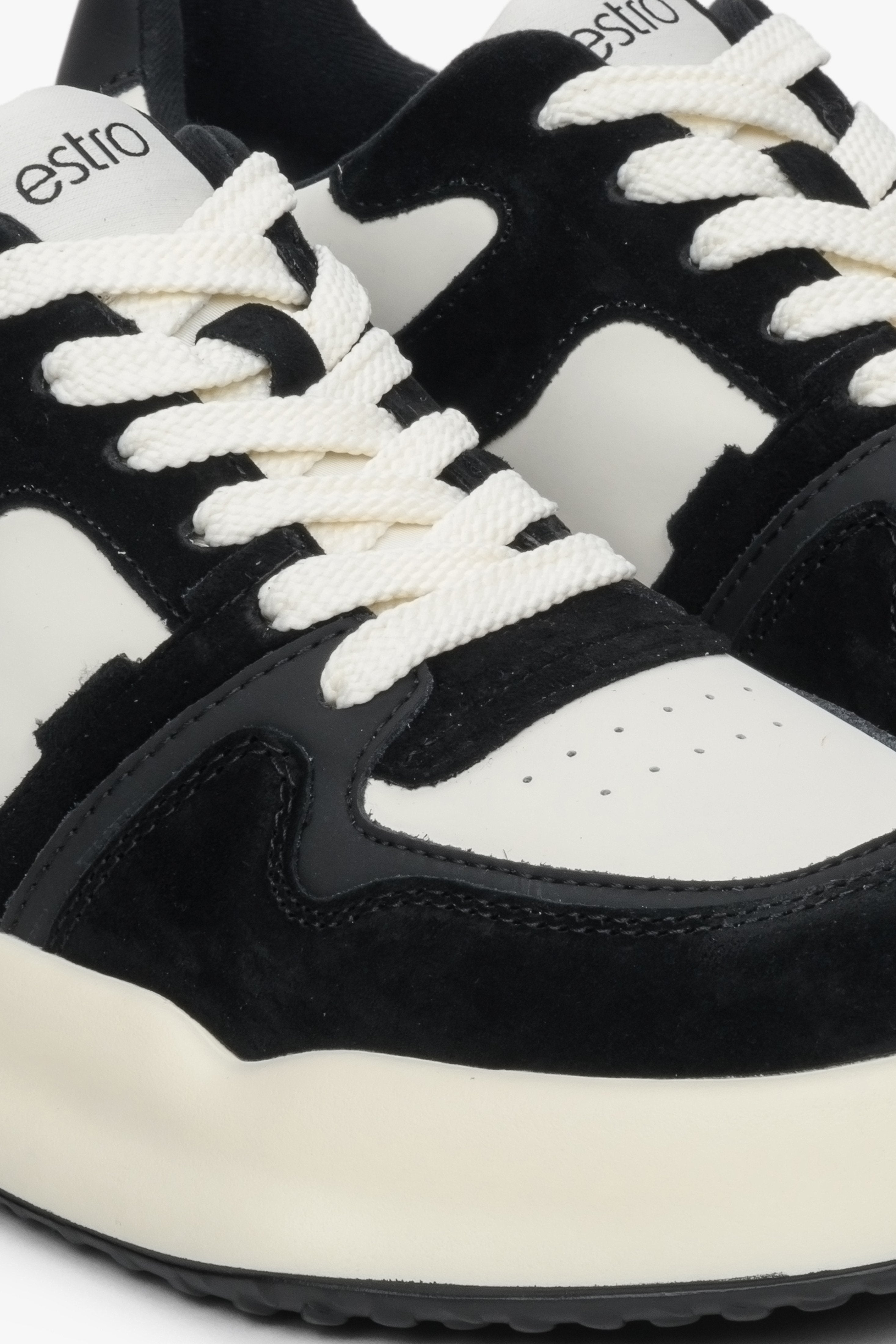 Sneakersy damskie z weluru i skóry naturalnej Estro - zbliżenie na detale w kolorze biało-czarnym.